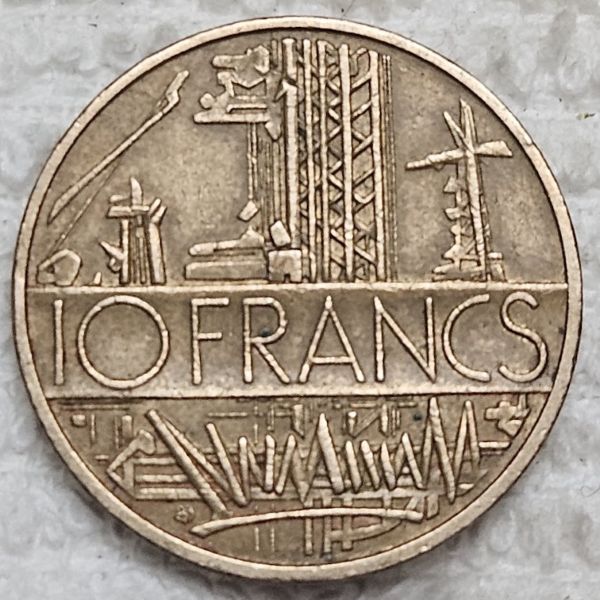 Post-Your-Coins-Or-Medals-With-Industrial-Imagery