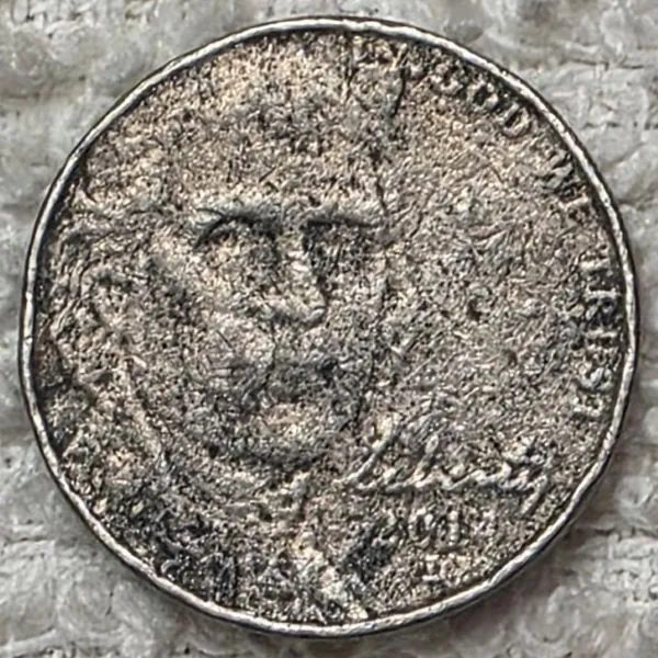 2014-D-Ghost-Of-Jefferson---A-Badly-Damaged-Nickel