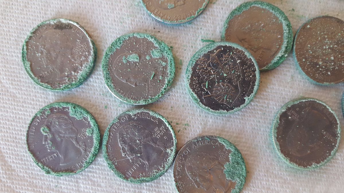 Bronze-Disease-Or-Verdigris-On-State-Quarters