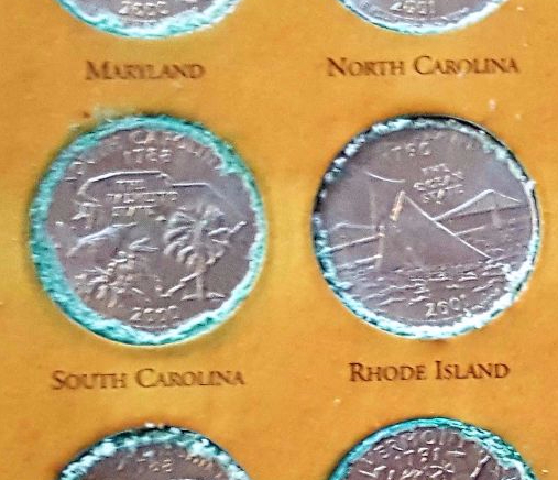 Bronze-Disease-Or-Verdigris-On-State-Quarters