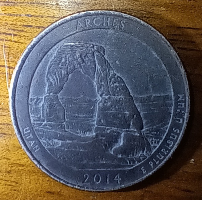 2014-D-Utah-State-Washington-Quarter-With-A-Big-Bump