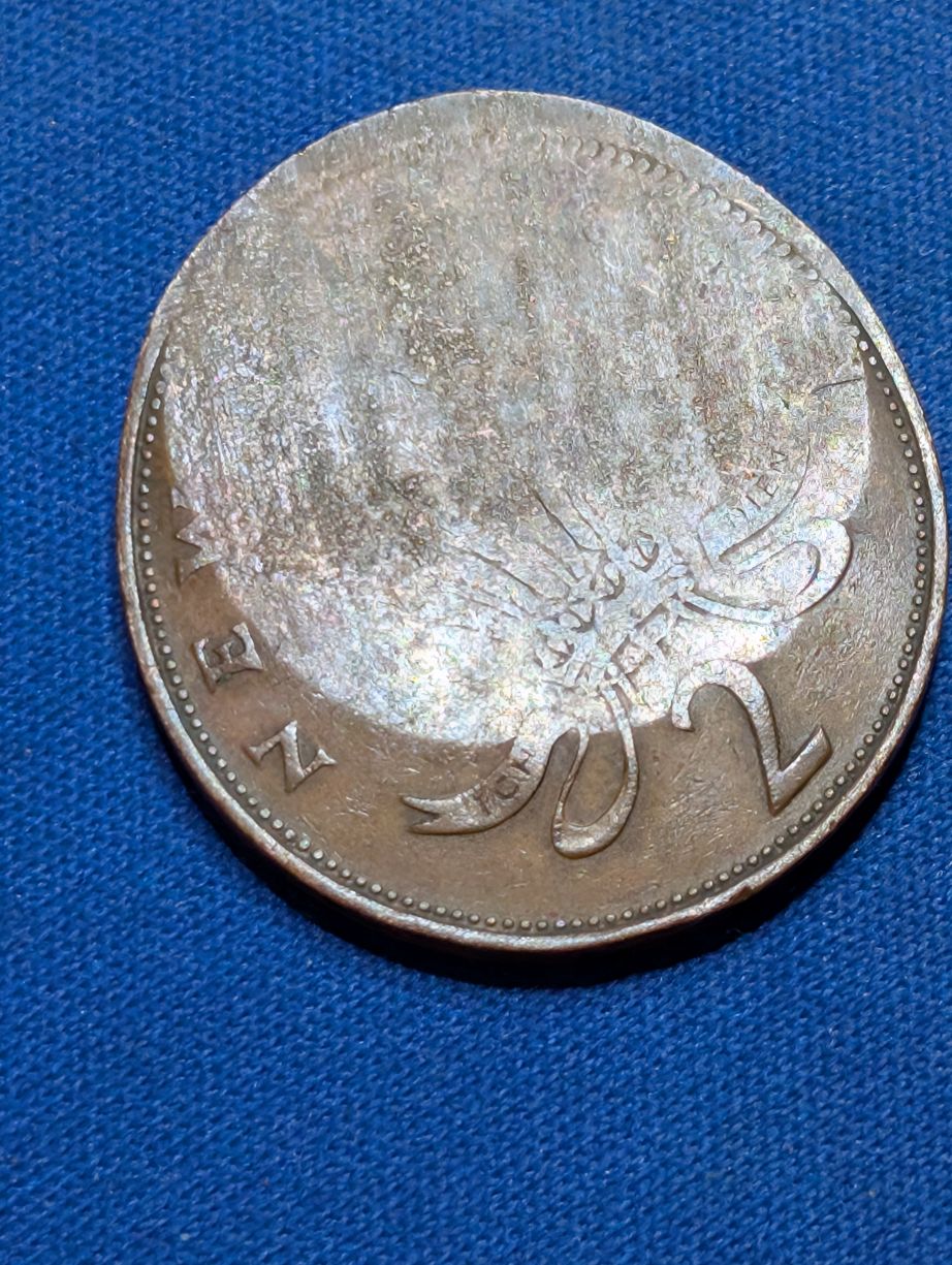 1p-Die-Stamped-Into-A-2p-Coin