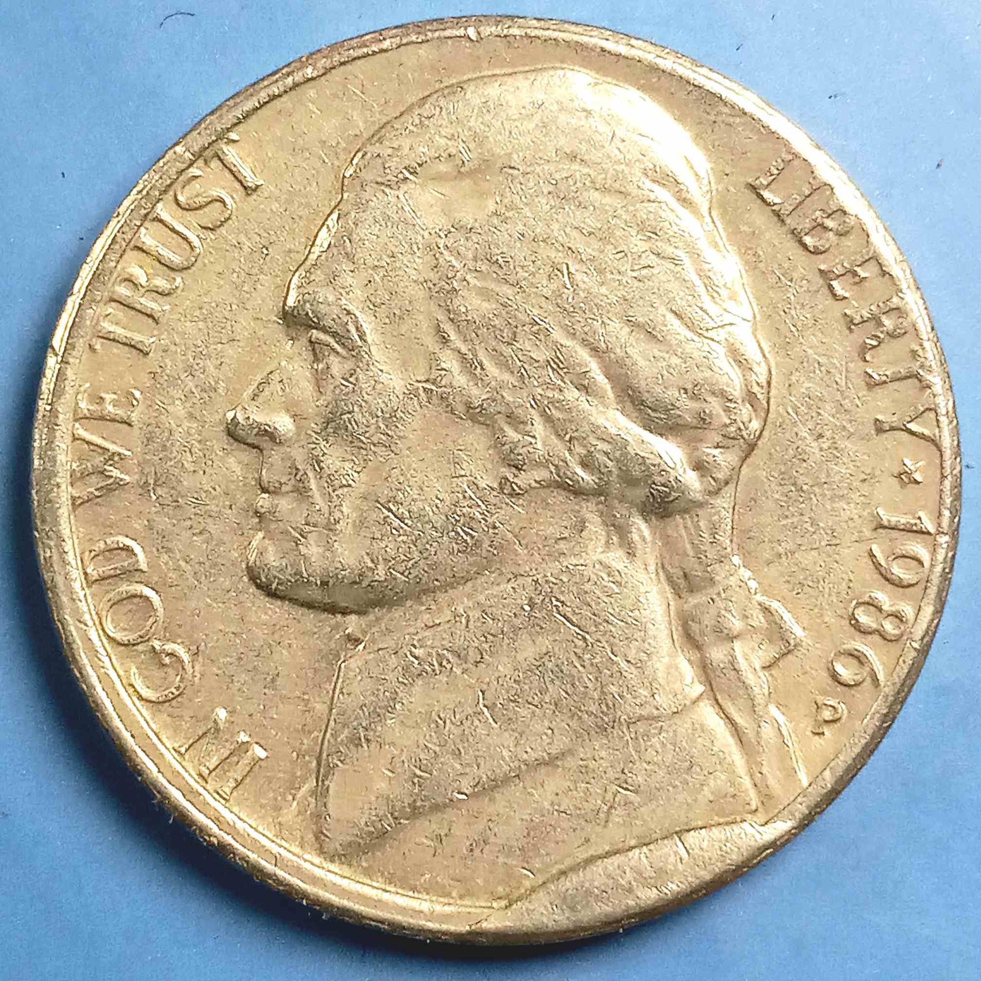 1986-A-Jefferson-Nickel.-Pocket-Change-Cud