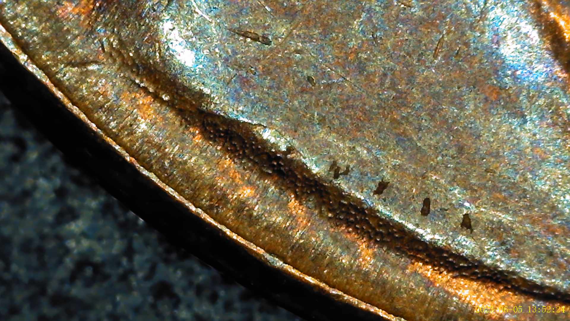 1955-Lincoln-Penny-Appearing-To-Have-Extra-Material-By-Ear-Lobe