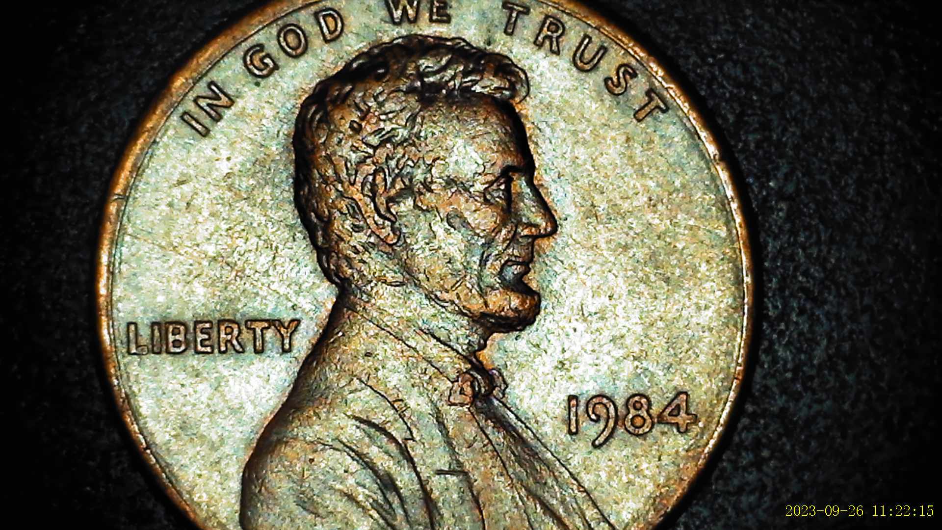 1984-Penny-Appearing-To-Show-Letter-Among-Motto-On-Reverse