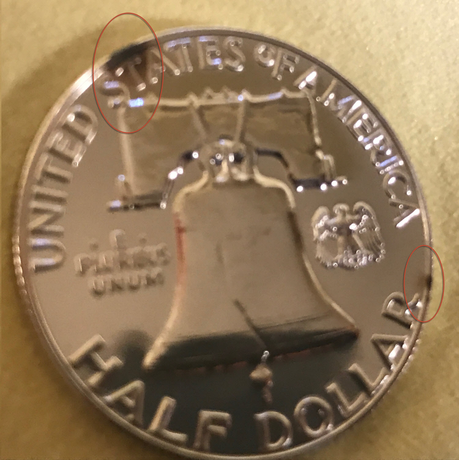 Small-Carbon-Spots-On-Franklin-Proof
