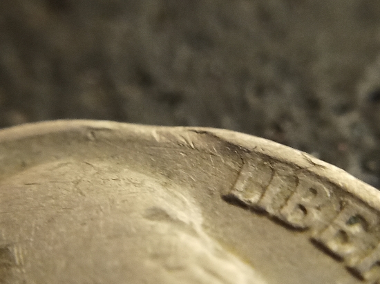1942-Jefferson-Nickel?-Strike-Thru?