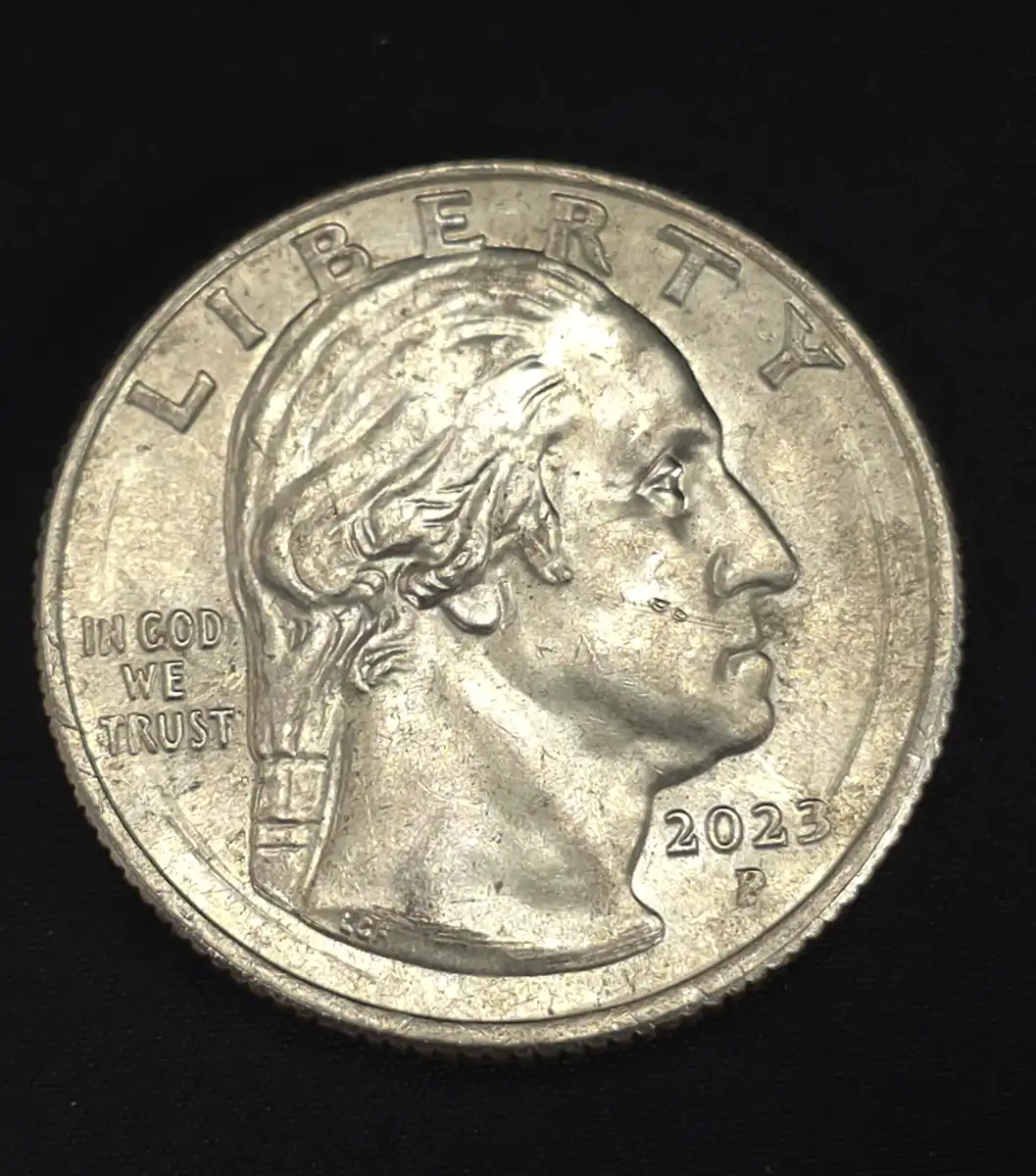 2023-Bessie-Coleman-Quarter-/What-Causes-These-Scratches-Behind-The-Design?