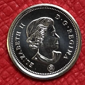 What-Are-The-Grades-Of-Thes-Three-Dimes?