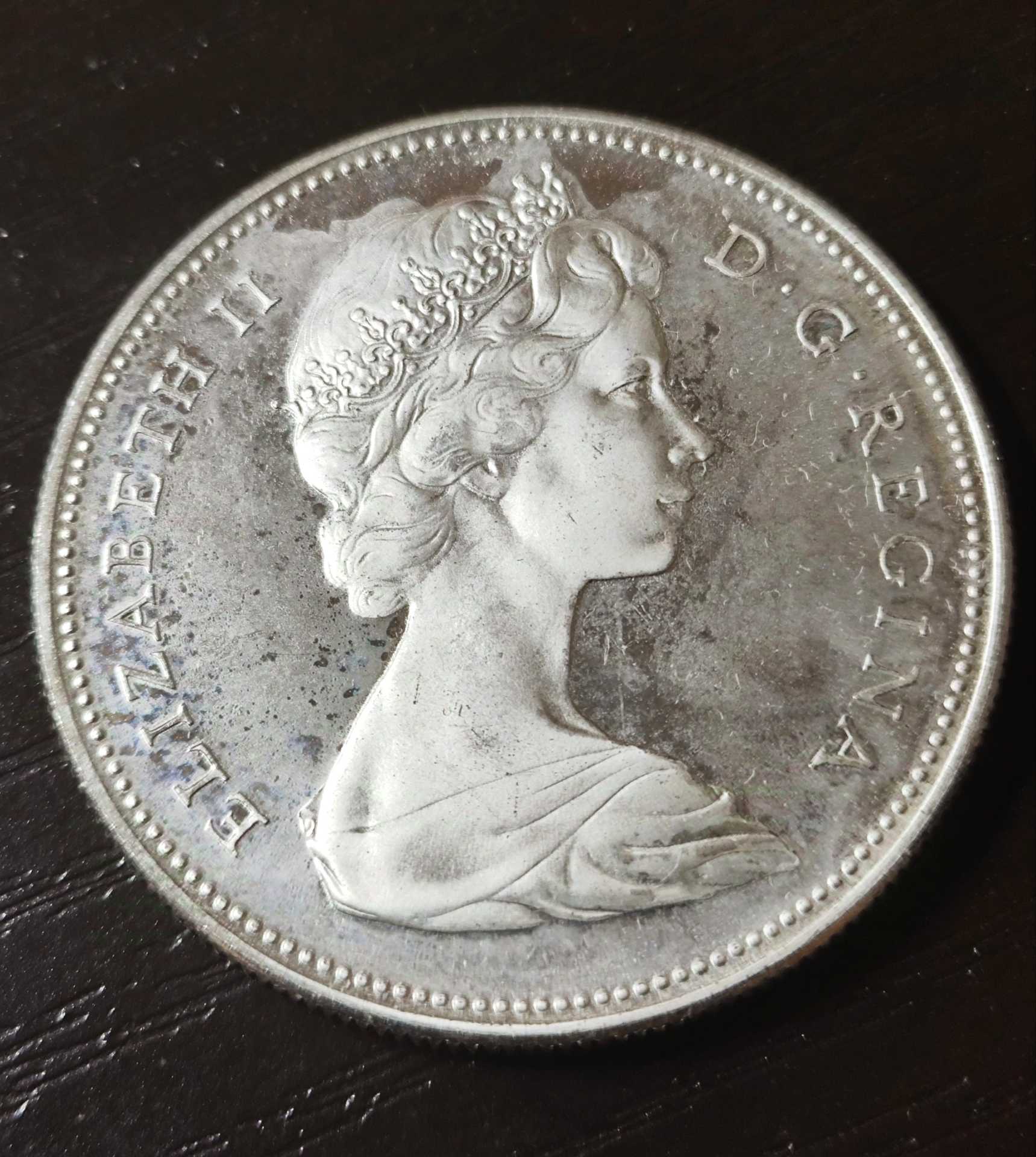 Need-Help-With-A-1967-Specimen-Dollar-That-Covers-By-Milk-Spot
