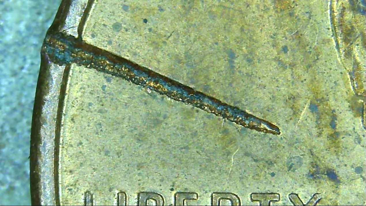 1996-D-Penny--Strange-Damage