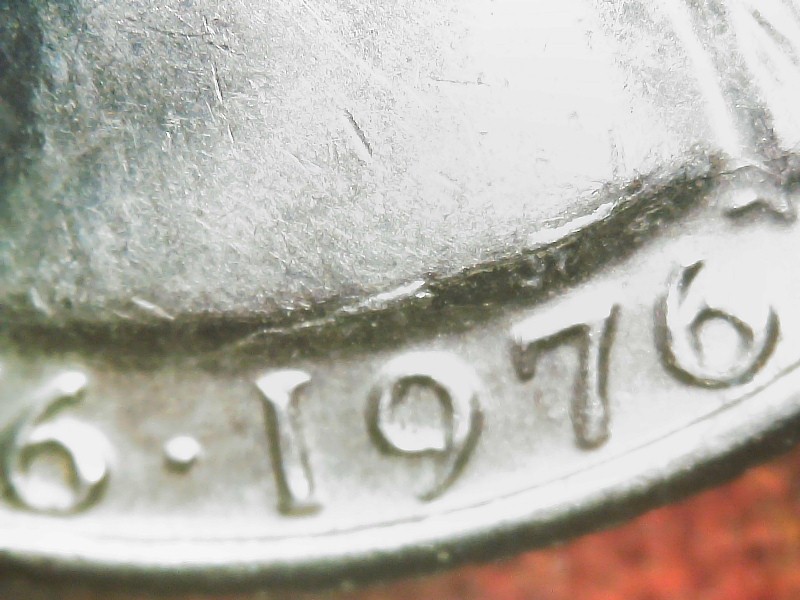 1976-Bicentennial-Quarter-Die-Break-Obverse?