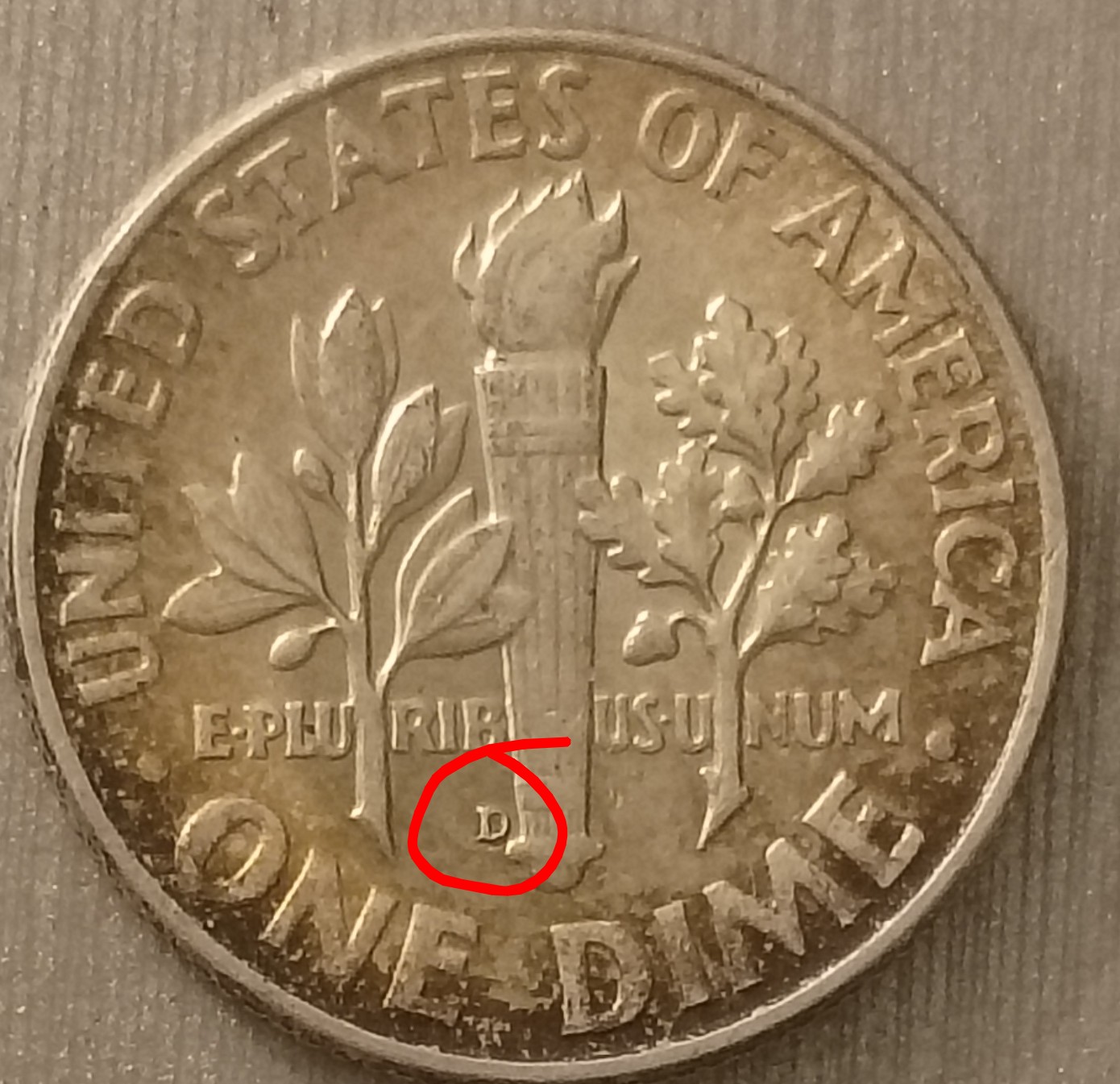 1963-Dime-No-Mint-Mark-On-Obverse-But-There's-A-D-At-The-Bottom-Of-The-Torch-On-The-Reverse