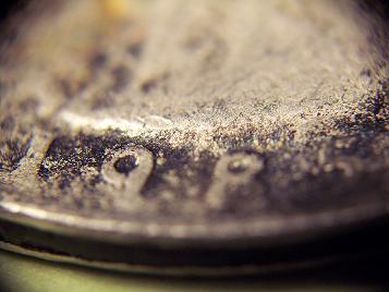 1985-Quarter-/-Copper-Showing-On-Edge
