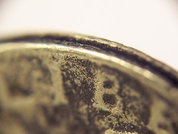 1985-Quarter-/-Copper-Showing-On-Edge