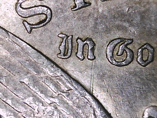 1889-O-Morgan-Dollar-Spiked-Wing?....vam?