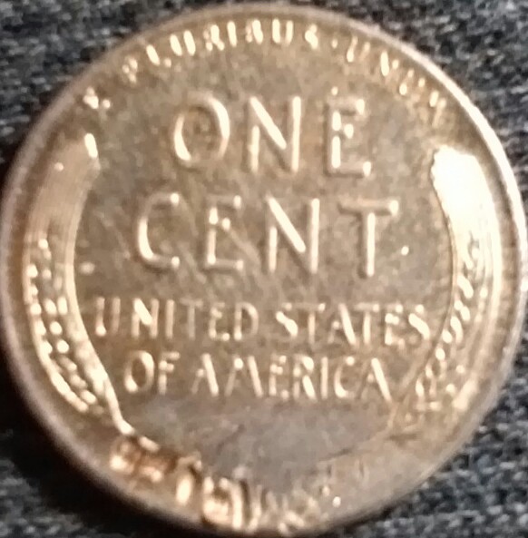Two-1957-D-Penny's-With-Golden-Color.-Is-This-Error?