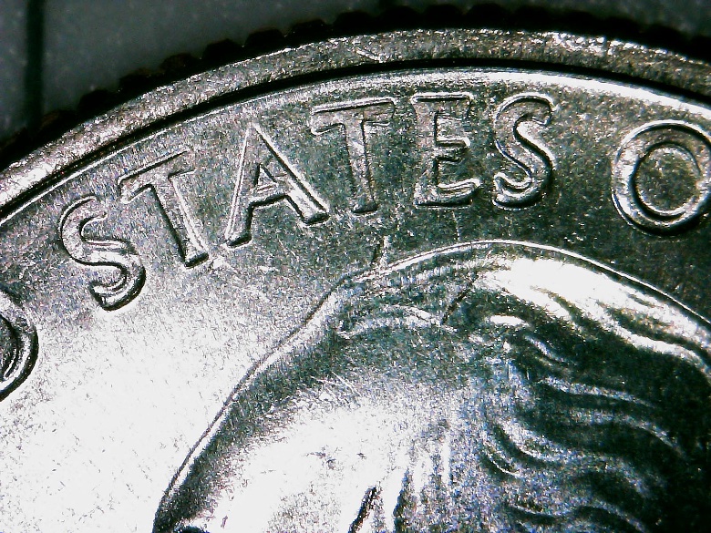 2020-D-Quarter----Die-Deterioration-/Struck-Through-Grease-Along-Edge?