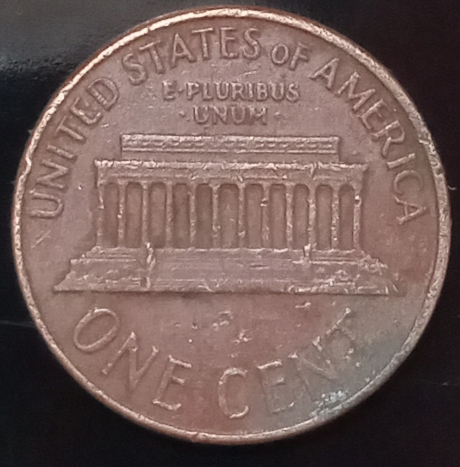 1948-D-And-1964-D-Pennies-With-Red-Coloring?