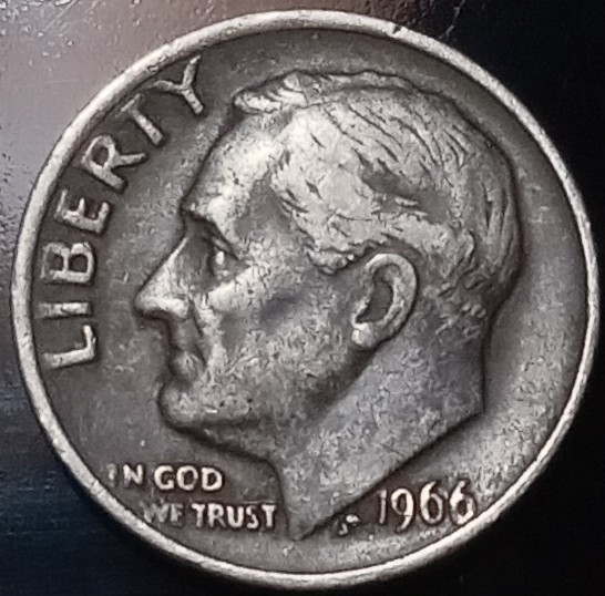1966-Dime-Looks-Black?