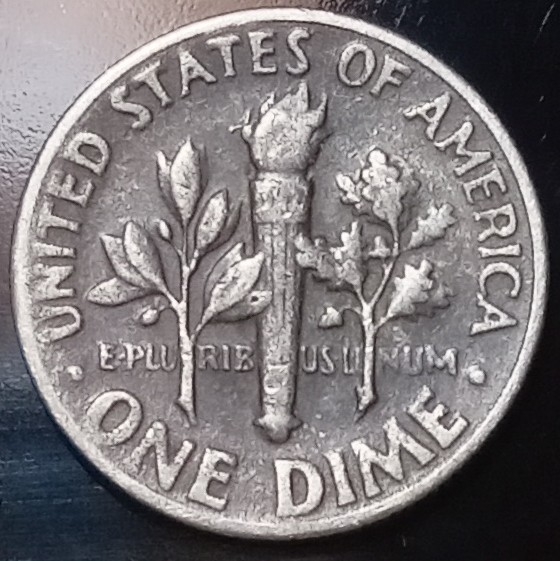 1966-Dime-Looks-Black?