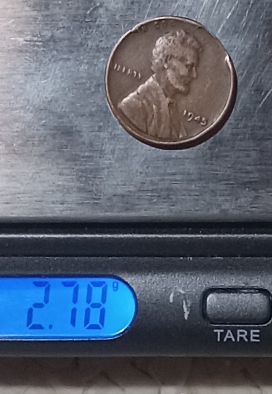 1945-Wheat-Penny.-Is-This-Damage-Or-Something-More?