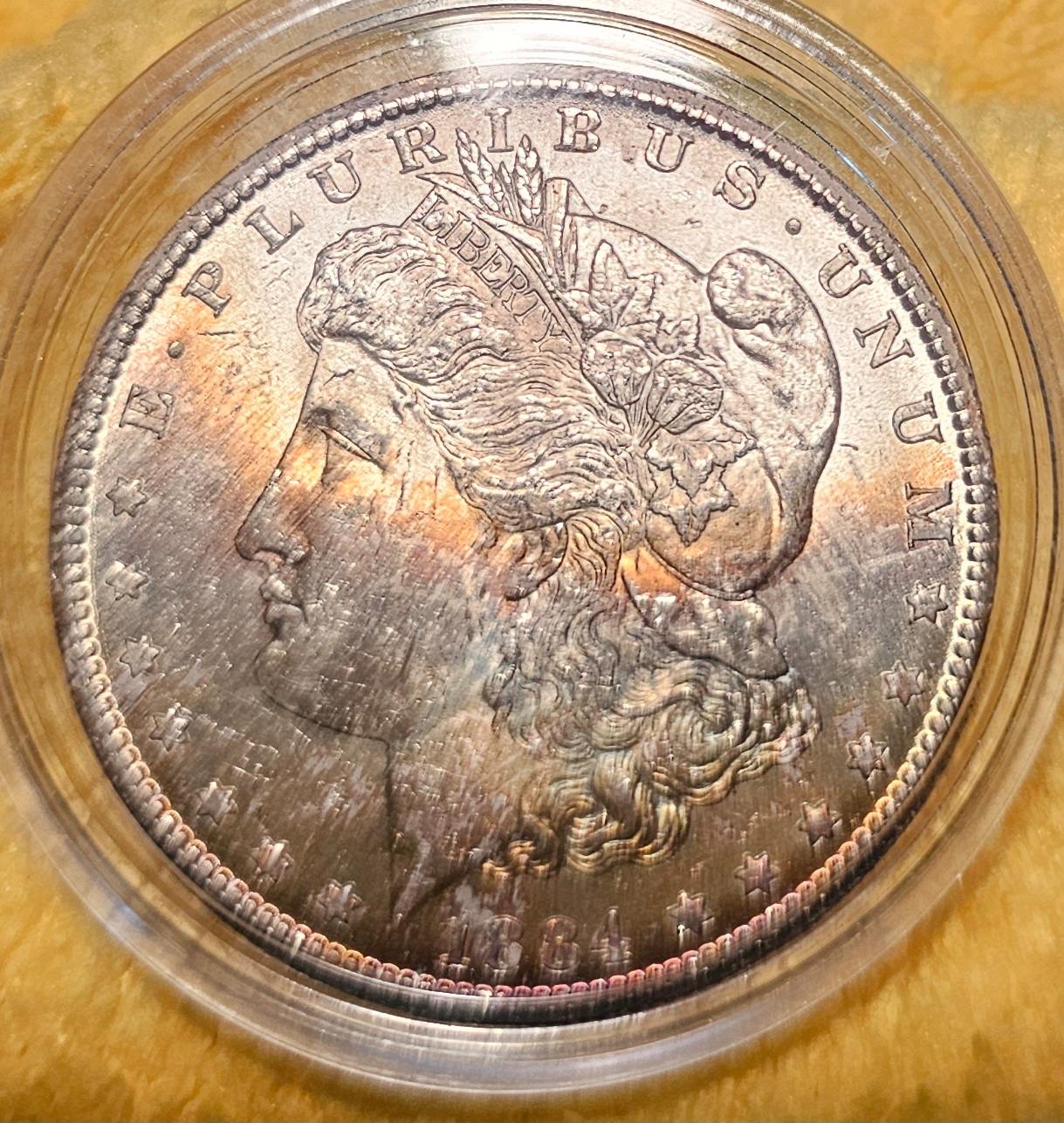 1884-CC-Morgan-Dollar---Rainbow-Toning