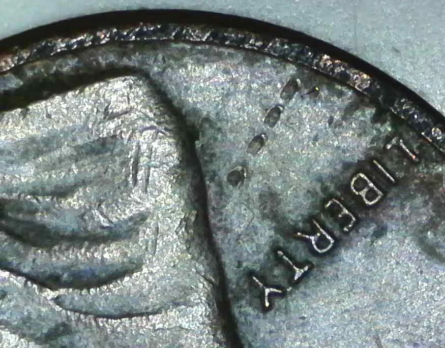 1985-Penny-Item-Under-Liberty-And-Partial-T-In-Trust