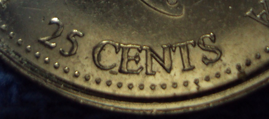 1999-Canadian-25-Cents-Error-Or-Worn-Die