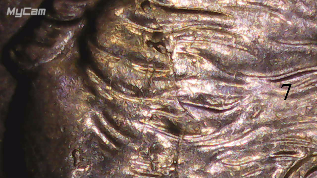 2021-P-Dime.-A-Lot-Of-Chips-And-Cracks-On-This-One.