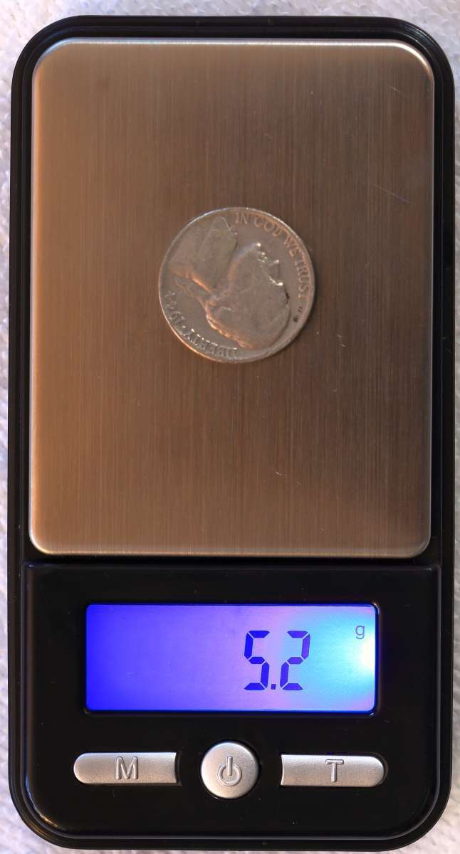 An-Authentic,-Genuine-And-Counterfeit-Henning-Nickel.