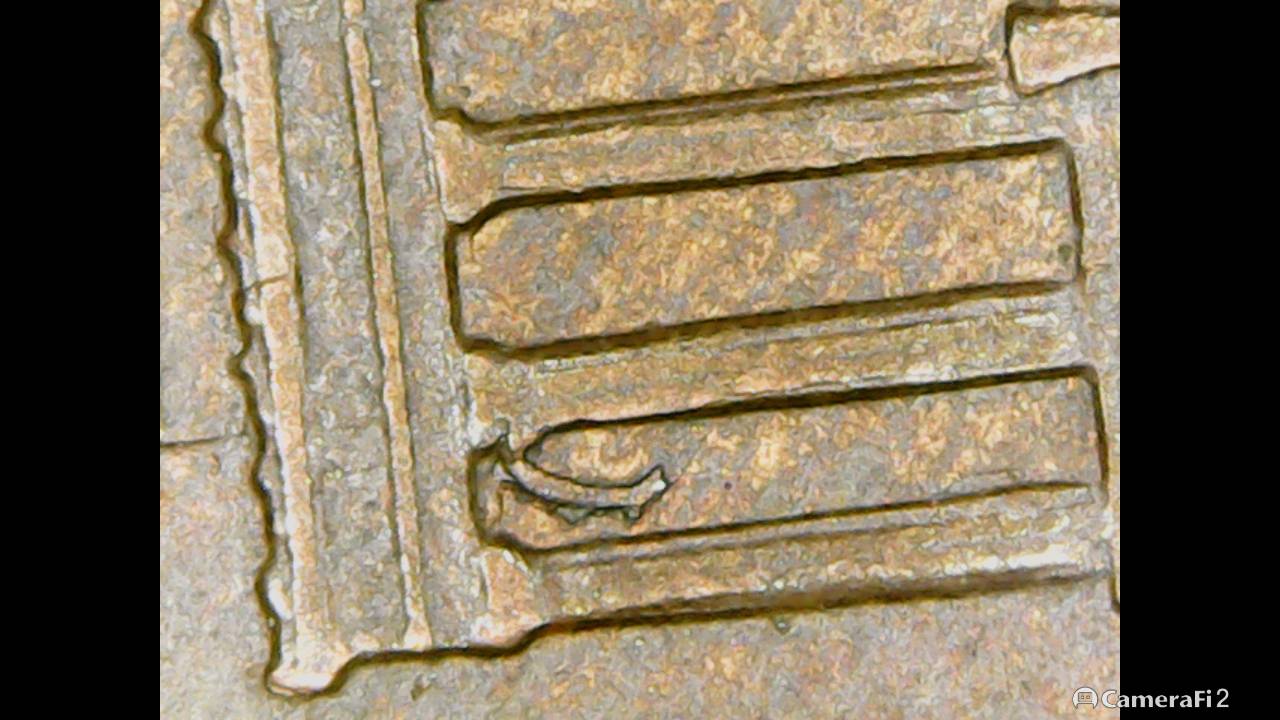 1999-Penny-With-A-Mark-I-Have-Not-Seen-On-Far-Left-Between-The-Columns..