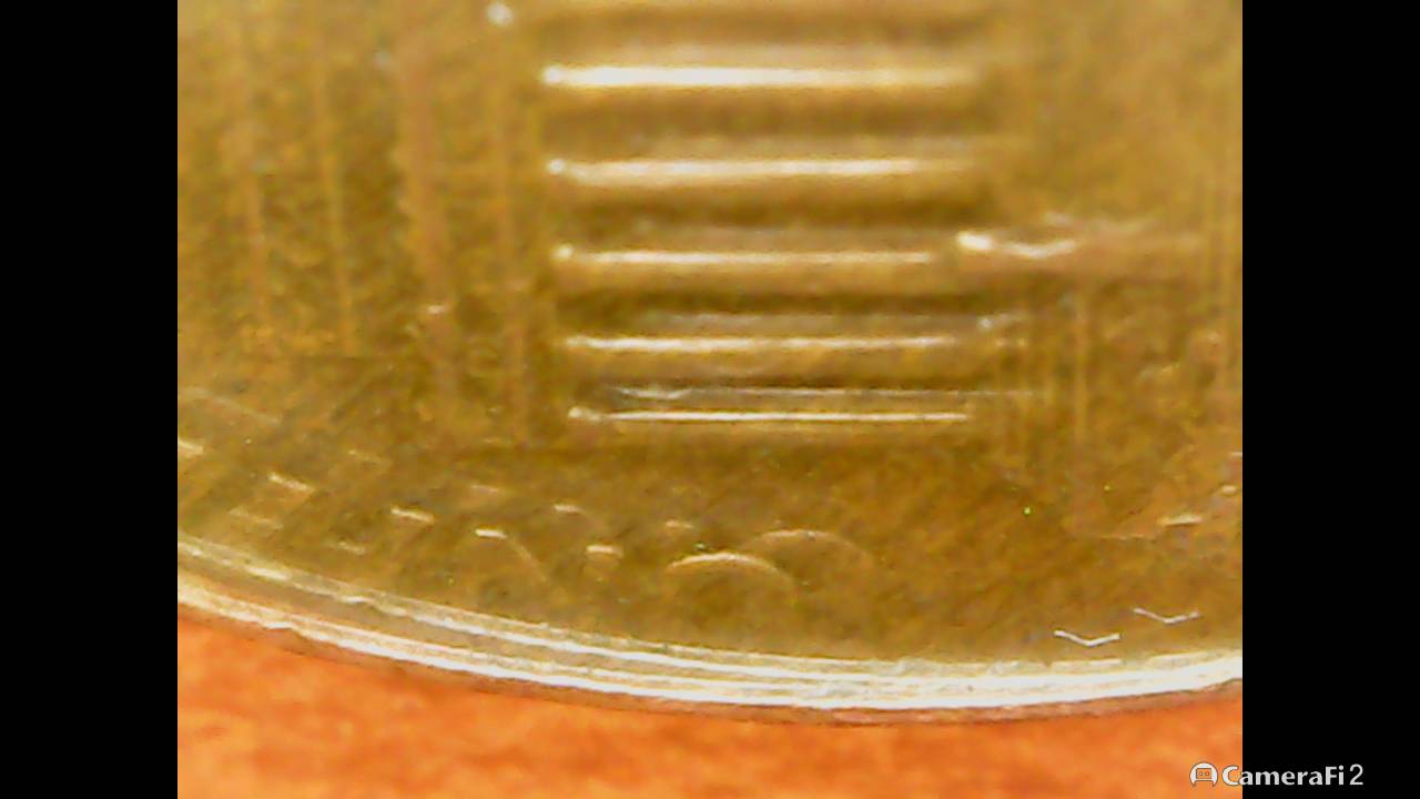1999-Penny-With-A-Mark-I-Have-Not-Seen-On-Far-Left-Between-The-Columns..