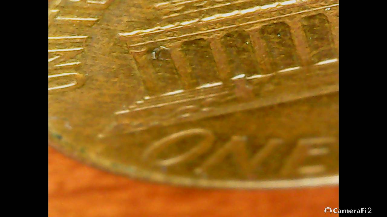 1999-Penny-With-A-Mark-I-Have-Not-Seen-On-Far-Left-Between-The-Columns..