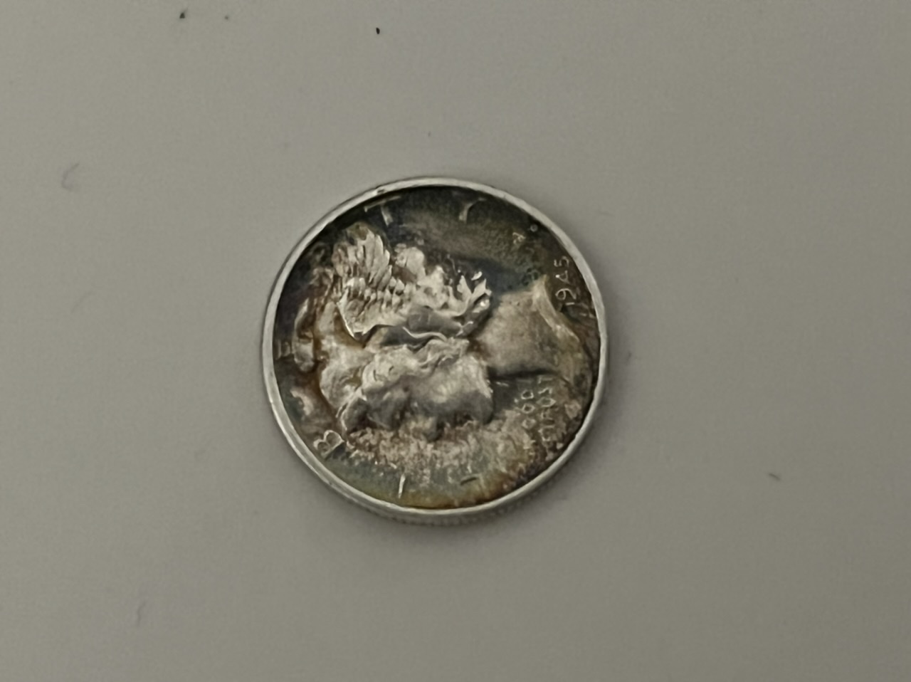How-Much-Is-This-~au50-1945-S-Merc-Dime-Worth?