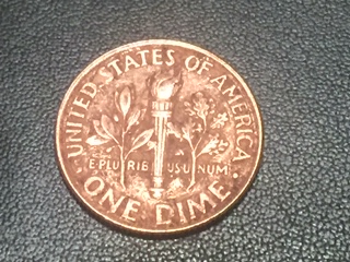 Clad-Error-Dime-From-A-Family-Member
