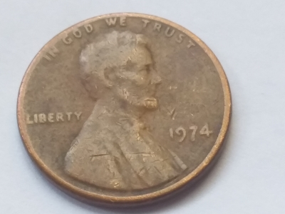 1974-Penny-Struck-Through-Grease-Or-Wear-And-Tear-Damage?