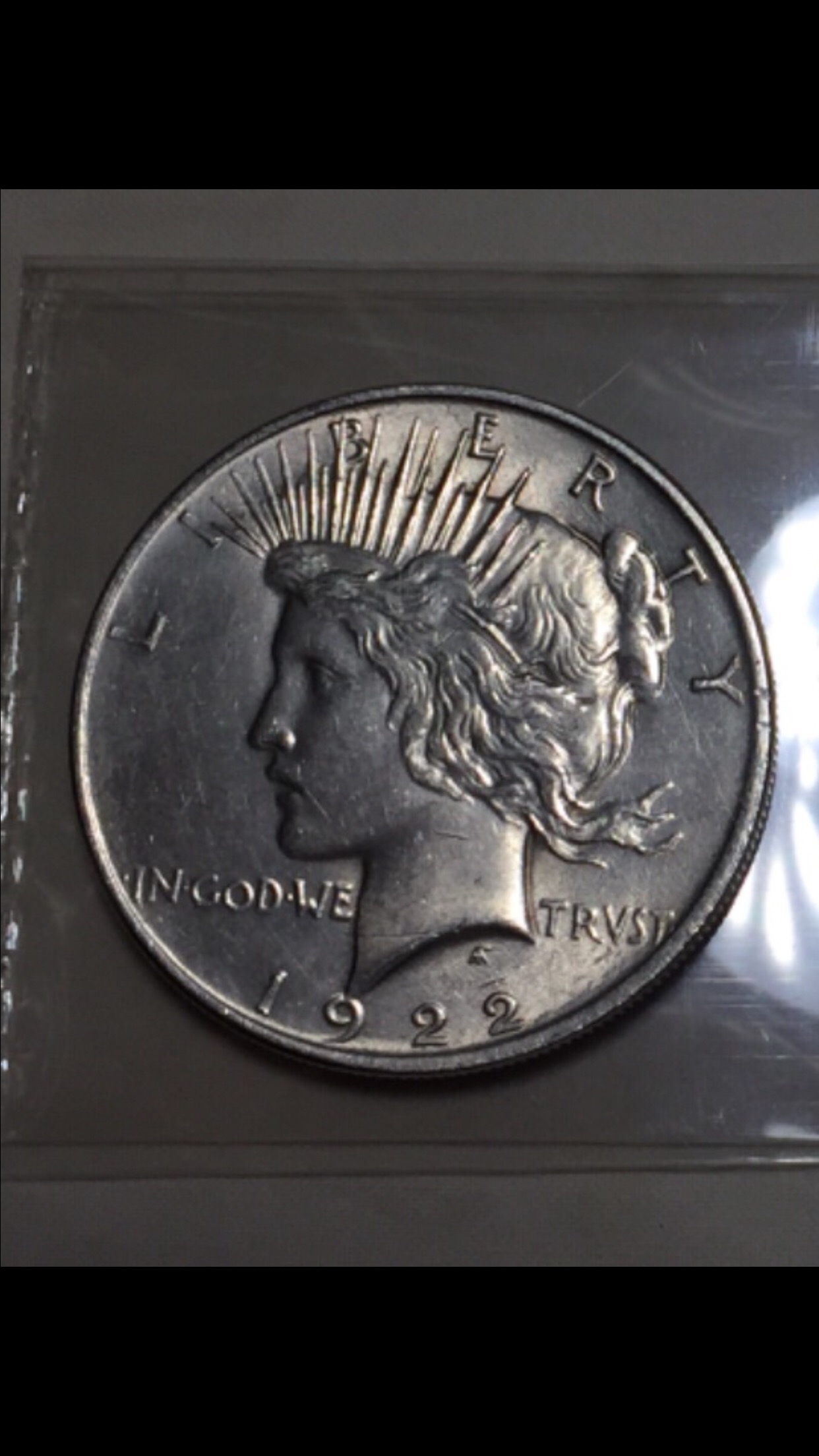 1922-Peace-Dollars-What-Grade-And-Which-One-Should-I-Keep-Help-Please