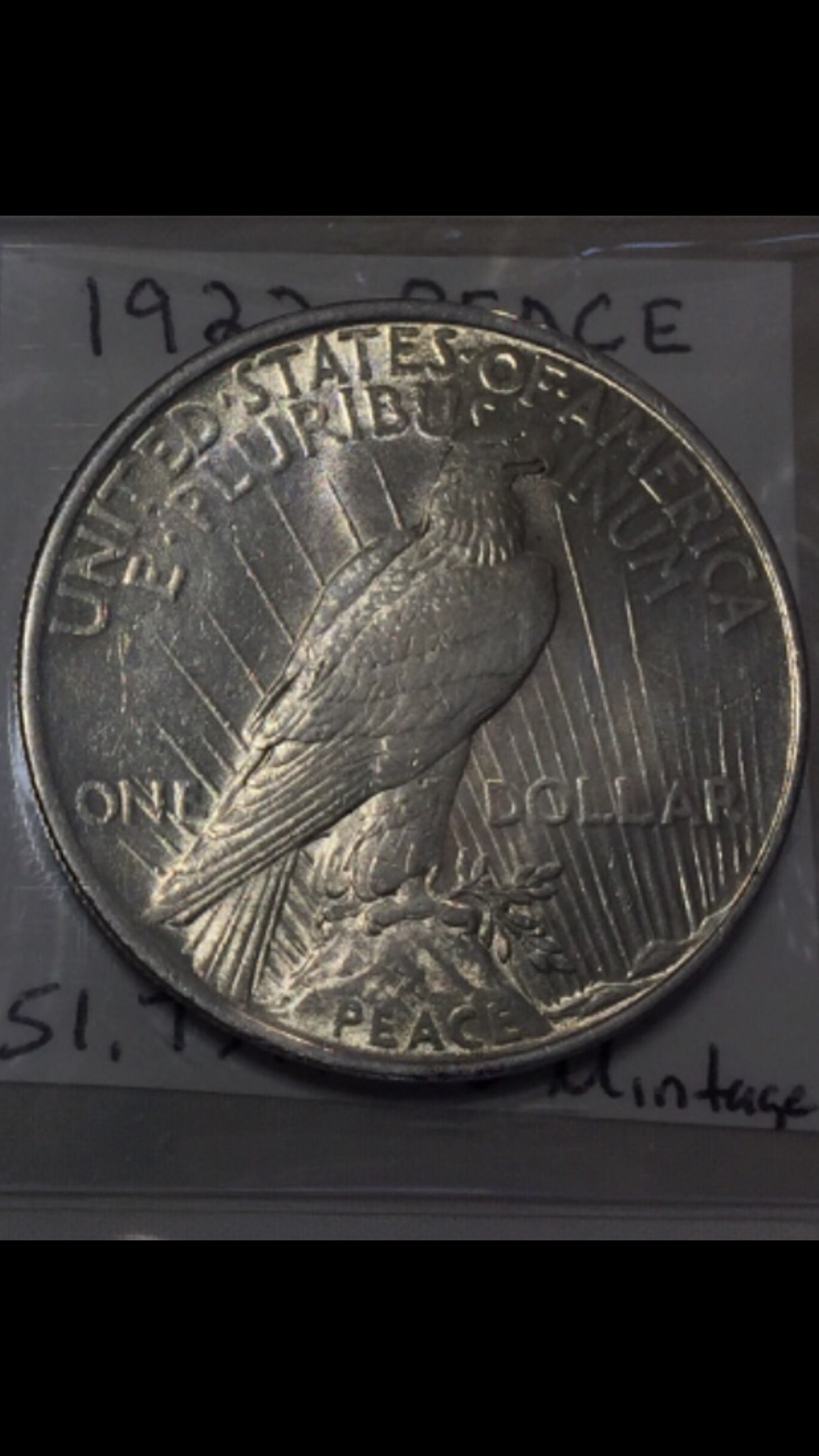 1922-Peace-Dollars-What-Grade-And-Which-One-Should-I-Keep-Help-Please
