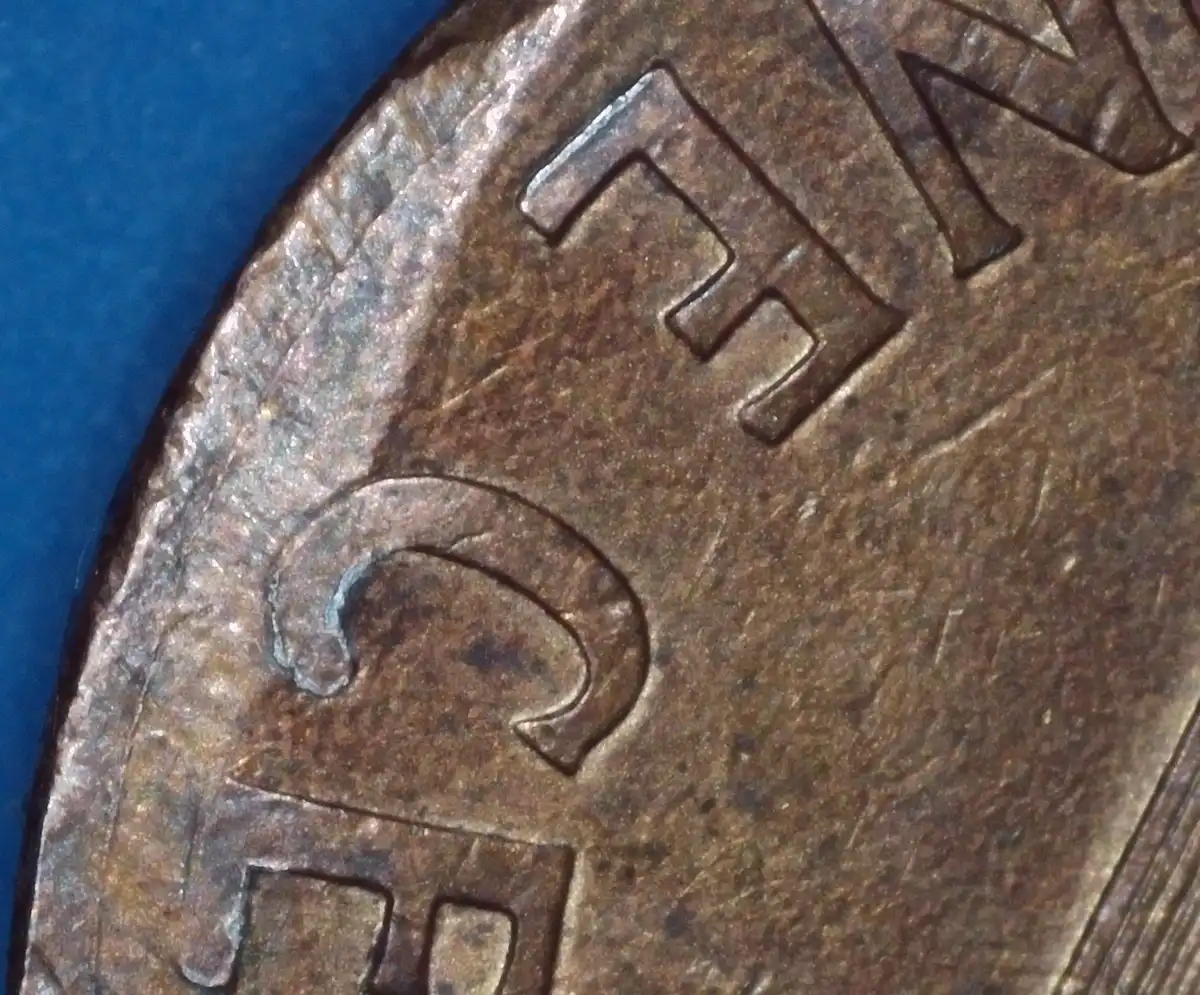 1999-D-Penny-Lincoln-Has-Stud-Earrings?-Rim-Issue?