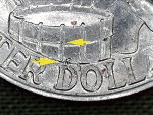 1976-D-Bicentennial-With-Metal-Bits-On-Reverse
