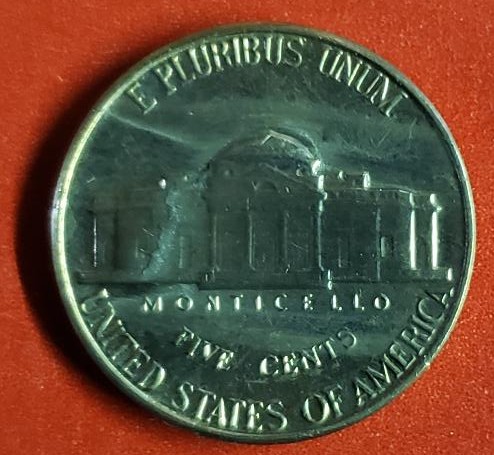 Unidentified-Schmutz-On-My-1959-Jefferson-Nickel
