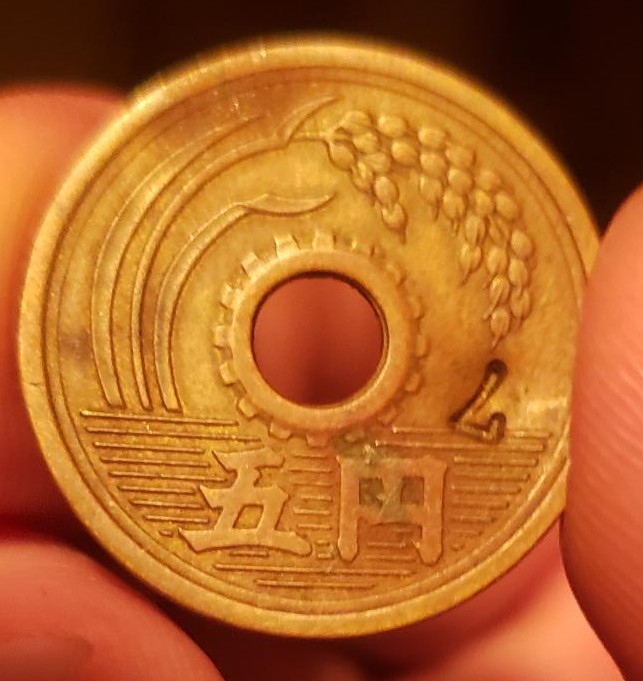 Five-Japanese-Yen-With-A-Counterpunch