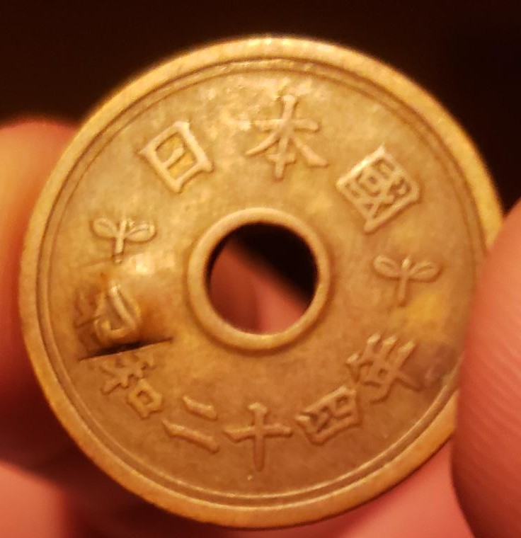 Five-Japanese-Yen-With-A-Counterpunch