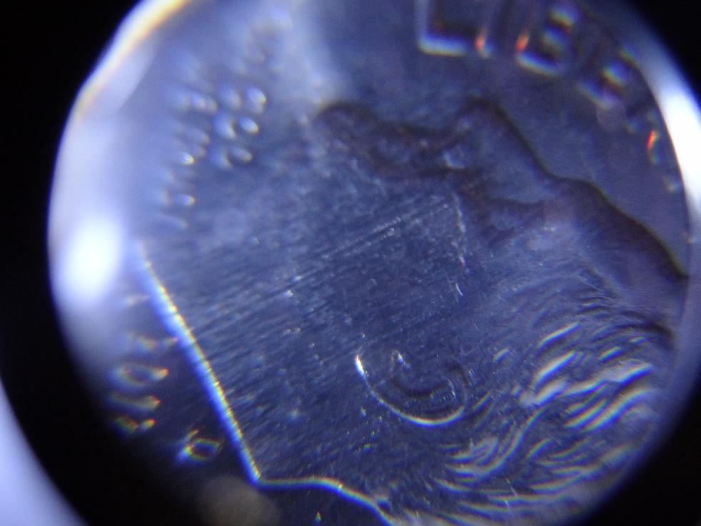 2012-D-Dime-With-A-Blotch-On-Cheek?