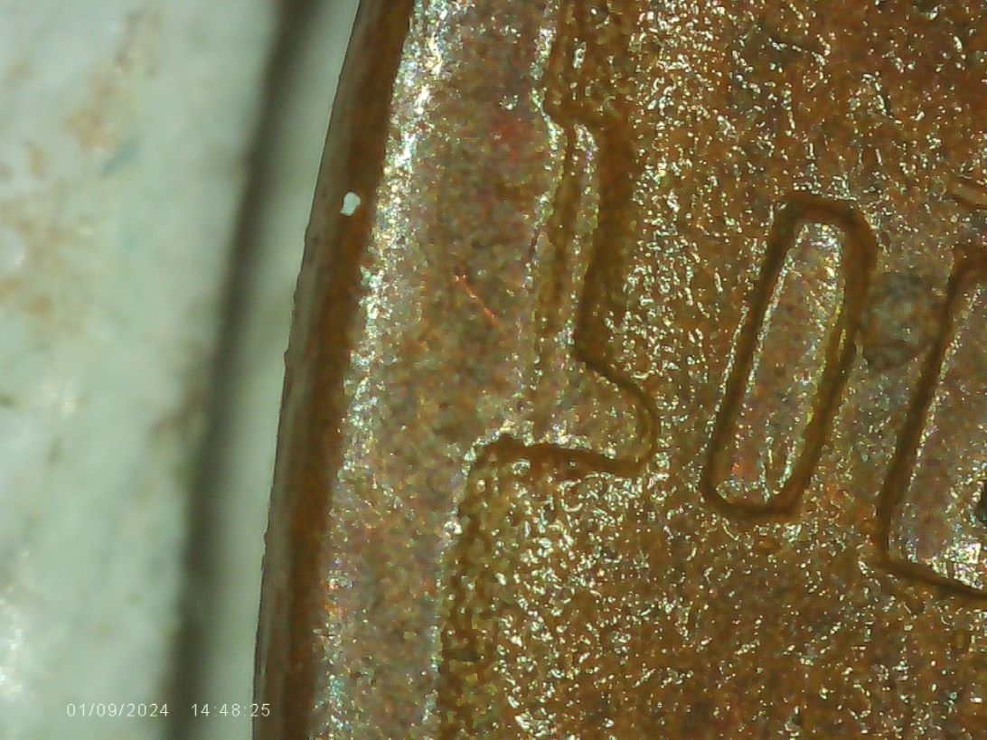 1951-D-Cent-With-L-Connected-To-Rim