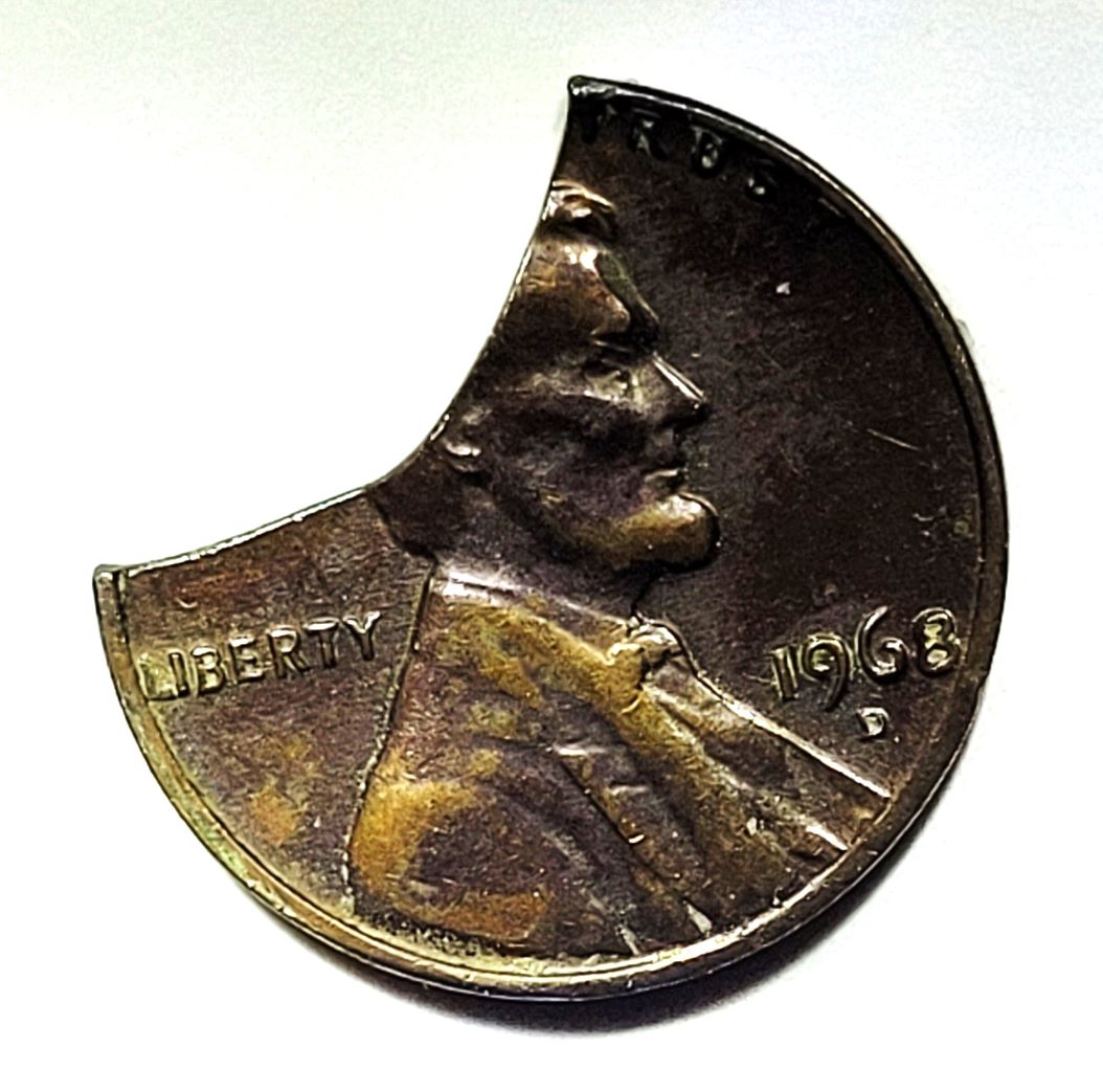 1968-D-Cent.-Looks-Like-A--Hack-Saw-Clip.