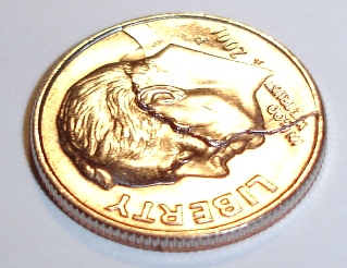 Broken-Die-Dime-And-Texas-Quarter-Pics