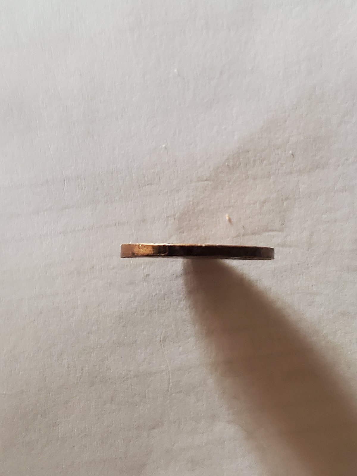 1973-Lincoln-Penny-With-Left-Side-Edge-Thicker.
