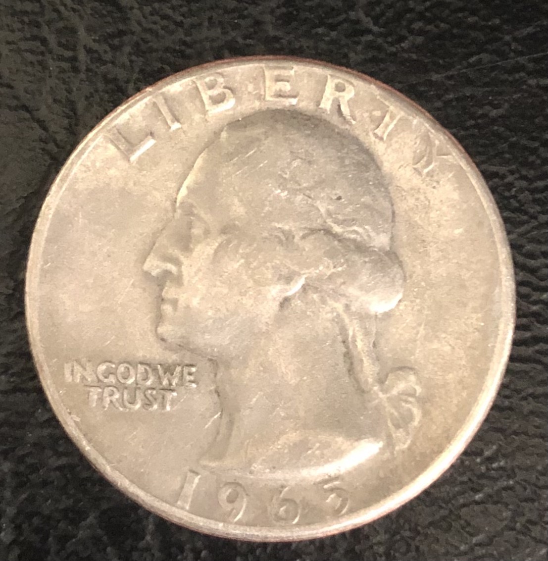 1965-US-Quarter-With-Letters-Very-Close-To-Top-Of-Coin